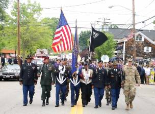 New York Task Force Commander Col. Peter Riley (far right) along with members of Warwick’s well-known Stewart family of military servicemen marched with the color guard followed by local officials, veterans and other organizations.