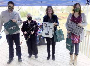 Items from the Library of Things were displayed on FPL’s deck on a balmy Friday, Nov. 20, and members of the public were invited to drop by to welcome the new collection. Pictured from left to right are: Village of Florida Mayor Dan Harter, Library Director Madelyn Folino, state Sen. Jen Metzger and new Village Trustee Alyssa Werner. Photos provided by Florida Public Library.