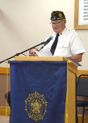 Photo by Ed Bailey Legion Commander Tom Mulcahy speaks at ceremony.