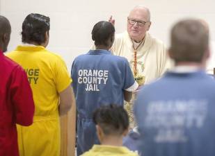 Cardinal Timothy Dolan, the Archbishop of New York, performed Catholic Mass for about 50 inmates at the Orange County Jail in Goshen on Nov. 25.