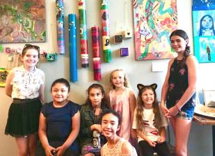 Each year the program holds a final exhibition, to the end of the month, at Consciousfork Restaurant, 14 Railroad Ave. Seven of the 16 Front Porch artists (ages 8 to 13), from left, are: Sara Venter, Jackie Rodriquez, Aleena Grossman, Shaina Ang , Maya Lustberg, Devin Torino-Morgolis and Violet Ross.
