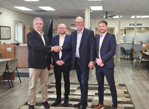 Leo Kaytes, Jr., welcomes the Fette family to Warwick. L-R: Leo Kaytes, Jr., Hart Fette, John Fette and Daniel Fette.