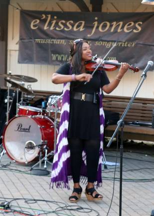 E'lissa Jones, songwriter, violinist, pianist, and guitarist, entertained her audience with many.
