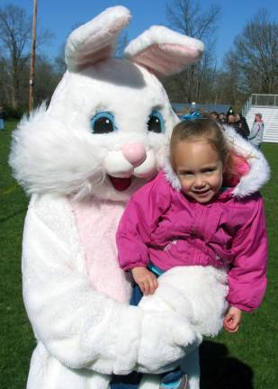 The Easter Bunny was also on hand to greet children like Sydney Introini, 3, and pose for photos.