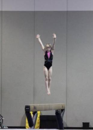 Six-year-old Emerson took first place in beam. Photo provided.