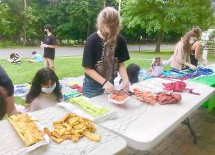 Members of SYLA working on a community art project. Photo provided by Melissa Shaw-Smith.