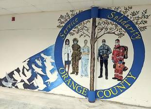 Members of the Bruderhof Community in Chester painted this mural at the COVID-19 vaccination POD (Point of Dispensing) in the Orange County Emergency Services Center in Goshen. The photo was provided to the Warwick Fire Department by Brendan Casey, the county’s Commissioner of Emergency Services. The photo, in turn, was provided to the newspaper by Michael Contaxis, the Warwick Fire Department’s 1st assistant chief. Contaxis also noted that the Bruderhof Community “always step up to help.”