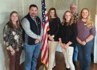 Warwick Rotarians added four new members in April. Shown, left to right, are Laurene Iammatteo, membership chair, who conducted the installation ceremony; new Rotarians Paul Ruszkiewicz, farmer and Orange County legislator; Tammy Scotto, Warwick realtor; Samantha Ferrari, customer relationships with Seely and Durland Insurance; and Chris Kane, retired New York firefighter and Warwick Ambulance Corps volunteer. At right is Rotary President Laura Barca. Photo by Jim LaPlante.