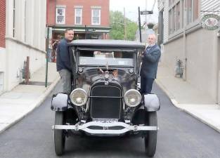 Orange County Executive Steven M. Neuhaus (left) and Village of Warwick Mayor Michael Newhard (right) drove over the Bank Street Bridge in Micah O’Connor’s 1923 Studebaker