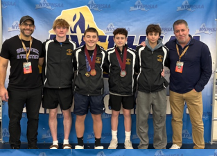 Coaches and members of the Warwick Diving Team at the NYSPHSAA championships.