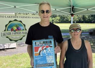 On Sunday Sept. 10, from 9 a.m. to noon, GWL Skatepark Corp. will host its first “Do It For Dale!” 5K Run/Walk which will begin at Thomas P. Morahan Waterfront Park and take a course through the village of Greenwood Lake. Greenwood Lake Skatepark Sponsorship Director Jonathan Sismey and Karen Wintrow, the market manager of the Lakeside Farmers Market in Greenwood Lake. Photo by Peter Lyons Hall.