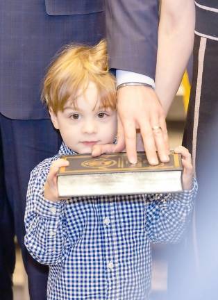 U.S. Rep. Pat Ryan's son Theodore holds the Bible used during Ryan's inauguration last Sunday at U.S. Military Academy at West Point. Photos by Sammie Finch