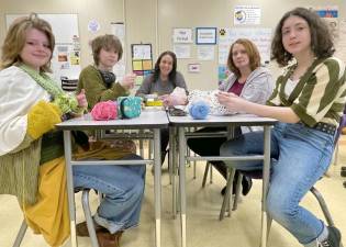 Get Hooked Crochet Club members (l-r) Sophie Quicke, Arlo Moller, Janna Milazzo, Cathy King and Felicia Gambino.