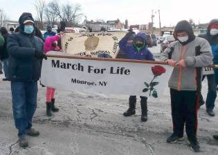 Liam and Colin Gralton holding the banner at the March for Life held Jan. 29 at the Park and Ride in the Village of Monroe. Photos provided by Rich Strobel, Respect Life coordinator for Sacred Heart in Monroe and St. Anastasia in Harriman.