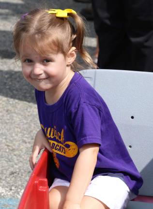With her special tee-shirt, Sabrina Hoti, 3, is obviously a Wildcats fan.