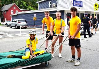 The Emerald Point Restaurant bed, “One in a Minion,” won the 2023 race. From left are rider Brielle Walker and drivers Mathew Buckley, Bailey Fry and Jaeden Walker.