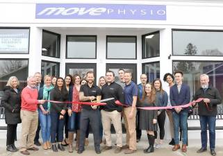 On March 6, Mayor Michael Newhard (far right) and members of the Warwick Valley Chamber of Commerce joined Dr. Justin Sullivan and his wife, Jessica (center), their staff, associates and clients, to celebrate the first year anniversary of Move Physio at 2 Overlook Drive in the Village of Warwick.