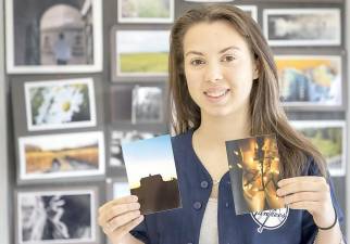 Superintendent's Artist of the Week Silvana Montalvo with two of her photographs on Jan. 25, 2021. Photo by Tom Bushey/Warwick Valley School District.