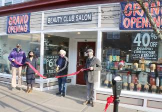 On Dec. 10, Mayor Michael Newhard (right) joined owner Steven Garbatow (center) for a ribbon-cutting ceremony organized by the Warwick Valley Chamber of Commerce to celebrate the grand opening of a new Beauty Club Salon at 46 Main St. in the Village of Warwick. Pictured from left to right: Media Consultant Chris Olert, Chamber Board member la Faroni, Beauty Club Salon owner Steven Garbatow and Warwick Mayor Michael Newhard. Photo by Roger Gavan.