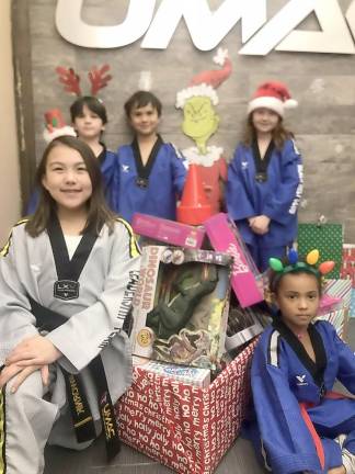 United Martial Arts Centers offered breakfast with Santa for $10 per family and donated 100 percent of the proceeds to the food pantry.