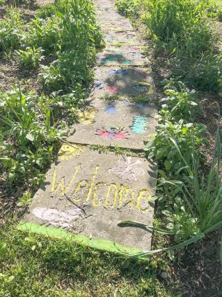 Colorful garden steps lead to local history