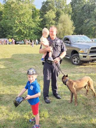 Gavin &amp; Kai are excited to see their dad, Warwick Police Officer Derek Kerstner and his canine partner, Fritz.