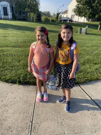 Elena and Madeline off to third and fourth grade.