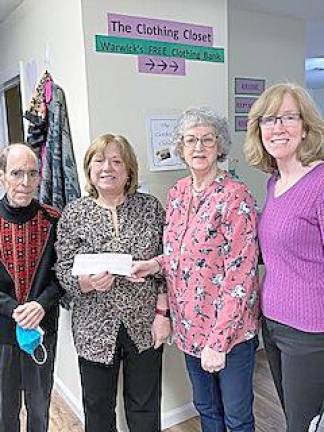 A check for $5863.57 was presented by Vision Board President Mimi Fader to Kathy Brieger, Executive Director of the WAFO.