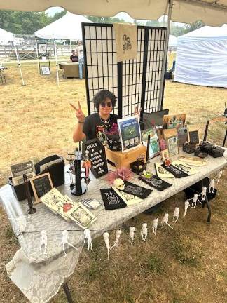 An artist displays their wares at a recent OC Live! event.