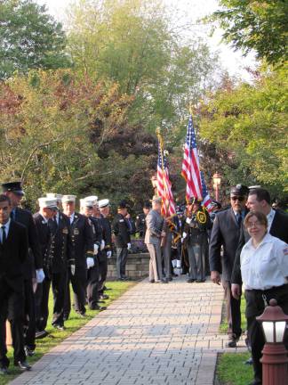 Photo by Julia Ramirez An honor guard of law enforcement and military personnel present the colors at the annual September 11th Remembrance Ceremony at Thomas Bull Memorial Park in Montgomery.