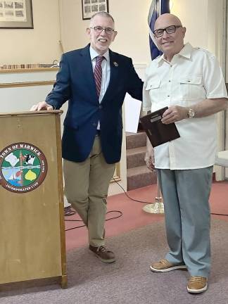 Warwick Town Supervisor Mike Sweeton shares a moment with former Warwick Friendly Visitor program Board Chairman Vince Copello. Photo provided by Lisa Bacenet.