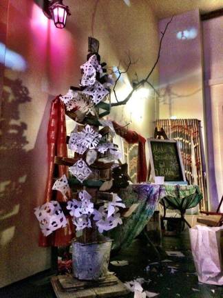 The Snowflake Tree is decorated with the individual snowflake art created by Pop-Up Market visitors.