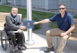 Orange County Executive Steven M. Neuhaus and Doug Hovey, President and CEO of Independent Living, Inc., in front of the Orange County Government Center on Monday, July 20. Provided photo.