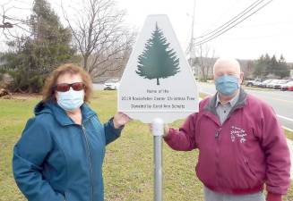 The Village of Florida has honored Carol Schultz for her donation of the 2019 Rockefeller Christmas tree with this memorial plaque. The plaque is located at the end of Scanlon Avenue on South Main Street. Pictured here are Carol and Florida Deputy Mayor Tom Fuller Sr. Photo provided by Beth Fuller/Florida N.Y. Chamber of Commerce.