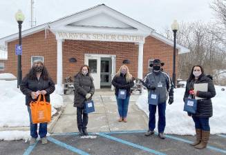 Office of Aging’s Sherry Zambrzycki, Friendly Visitor Program Recording Secretary Denise White, FVP CoChair Dana Castine, FVP Chairmen Vince Copello and FVP Coordinator of Volunteers Lisa Bacenet in front of the Warwick Senior Center during last Saturday’s volunteer appreciation event. Provided photo.