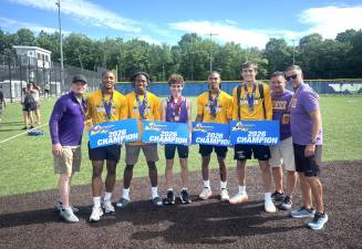 Warwick Valley Central School District boys track and field coach Mike Potter received the U.S. Track and Field and Cross Country Coach of the Year for New York State.