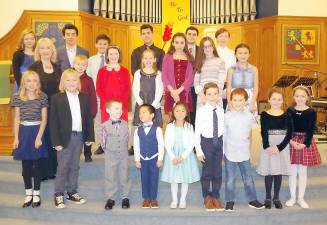 Piano students of Ann Lewkiewicz played a variety of piano solos at the 23rd annual Piano Recital held at the Warwick Reformed Church on Nov. 23. Pictured from left to right, beginning in the first row, are Juliana Adee, Cole Aronov, Ronan Sezack, Dylan Chan, Mila Chan, Griffin Luthin, Luke Cirillo, Layla Wright and Lina Lauritsen; second row: Ann Lewkiewicz, Wesley Lewkiewicz, Fiona Sezack, Alix Ragans, Angelina Kanz, Sophia Amato and Nina Cirillo; and third row: Gwen Redman, Nathan Durgin, Owen Durgin, Ben Durgin, Mark Coiro and Lionel Wolfe.