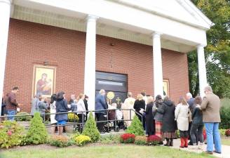 On Sunday, Oct. 20, members of St. Ignatius Orthodox Church, 75 North Main Street in the Village of Florida, gathered outside to celebrate the blessing of their new front doors and a new stairway which leads from street level up to the church property.