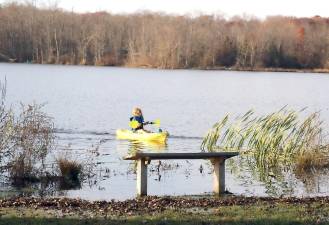 This youngster enjoys great weather for ayaking on Wickham Lake. Photos by Roger Gavan.