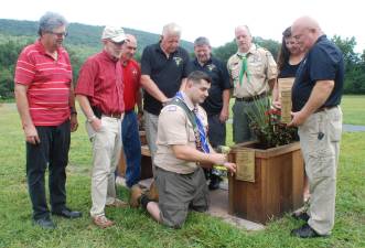 Left to right are: Russell Kowal; Michel Sweeton; James Gerstner; Denis Mulcahy; Eagle Scout Shea Gormley (kneeling); Sam Gormley; Scoutmaster Jason Fox; Kathleen Holder; and Vincent Hallinan.