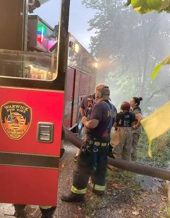 Driver trainee firefighter Joe Bonsignore learns to pump from the QWarwick Fire Department’s draft site at Memorial Park.