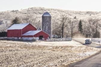 The ice storm left the landscape coated with frozen rain around the Belvale Farms barn on State School Rd in Warwick.
