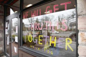 On Monday, March 30, the front window at Dunkin' Donuts in Warwick offered the following hope: We Will Get Thru This Together. Warwick Strong.