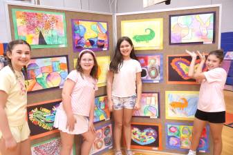 Golden Hill students display their work at the school’s annual art show.