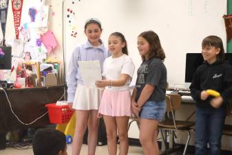 Fourth graders perform original blues pieces.