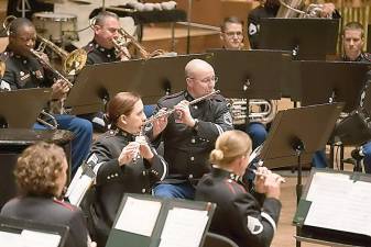 Under the direction of Lt. Col. Tod Addison, the West Point Band celebrated its Bicentennial with a performance at David Geffen Hall at Lincoln Center on Oct. 29th, 2017. In attendance were leaders from the United States Military Academy at West Point, West Point Band alumni, composers who have written works for the band, and members of the public. On the program were works of historical significance to the band as well as several world premieres. The West Point Cadet Glee club joined with the band under the baton of Ms. Constance Chase to sing the Alma Mater, The Corps and other West Point songs.