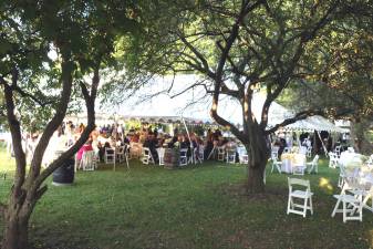 On Saturday evening, Aug. 24, almost 200 guests gathered both outside and under the tent in Lewis Park in the Village of Warwick for the Warwick Historical Society's 48th annual Party in the Park.