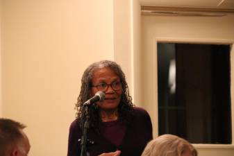 Beverly Braxton speaking at the We the People Warwick Mental Health Forum she organized.