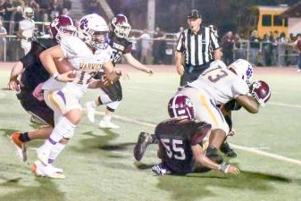 Warwick’s Christian Felix (73) delivers a block to spring QB Nick Dimarco (12) for a TD against the Kingston Tigers on Friday Night October 15th at Kingston’s Dietz Stadium.