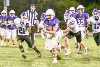 Warwick QB Nick DiMarco passed for more than 150 yards and rushed for 100 in the team’s loss to Monroe-Woodbury on Friday night, Sept. 24, at home. Photo by by Al Konikowski.